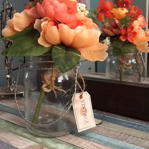 Vintage jar with faux flowers centerpiece